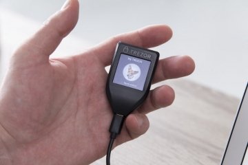 TREZOR T in hand